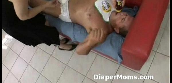  Horny mommy takes off chunky adult babys diaper off then strap-on fucks him